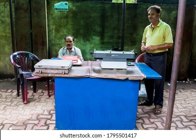 Raipur, Chhattisgarh, India/ October 25, 2019: A Typist Using Vintage Typewriter For Typing Legal Document. 