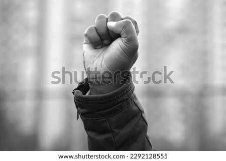 Raised black man fist in protest. Fist of african american, social justice and peaceful protesting racial injustice