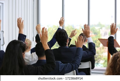 voting hands up