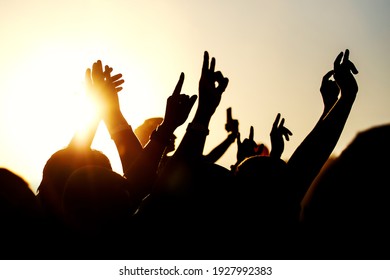 Raised Hands Of Many People At A Big Mass Event.