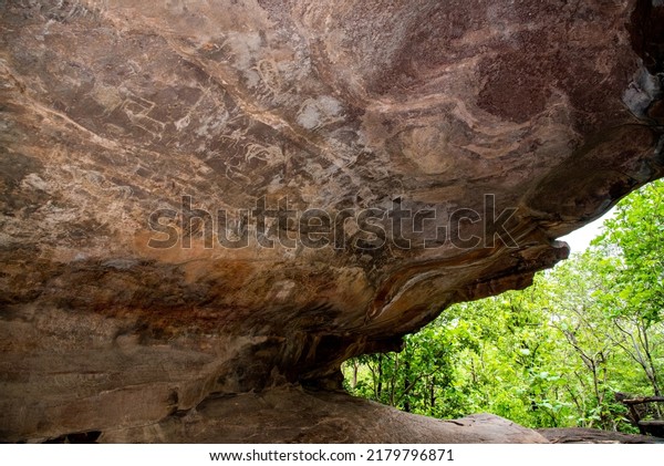 Raisen, Madhya Pradesh, India: 05 July 2022
Paintings on wall of caves believed to be made by primitive cave
dwellers at Bhimbetka a UNESCO World Heritage near Bhopal Raisen,
Madhya Pradesh, India