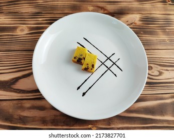 Raisin Cake In A Plating Style
