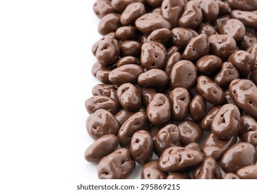 Raisin With Chocolate On White Background