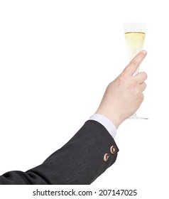 Raising Of Champagne Glass In Businessman Hand Isolated On White Background