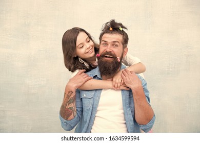 Raising girl. Create funny hairstyle. Child making hairstyle styling father beard. Being parent means present for kid interests. Change hairstyle. Daughter hairstylist. Enjoy fatherhood. Happy moment. - Powered by Shutterstock