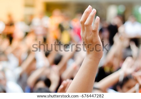 Raising Hands for Participation.