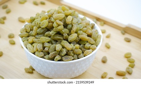 Raisins or Kismis are a great snack option with good range of nutrients that can be added to the diet. Kishmis. Golden and green Raisins. Kish Mish.  - Shutterstock ID 2159539249