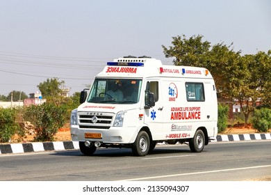 Rajasthan, India - March 2, 2022: Ambulance car Force Traveller at an interurban road.