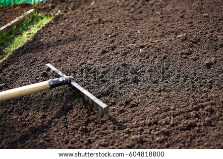 Rake the bed level,  cleaning in the garden and in the fields