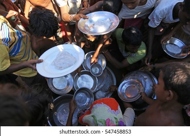 RAKHINE STATE, MYANMAR - NOVEMBER 05 : Rohingya People Are Receiving Food From Donations, On NOVEMBER, 2015 In Sittwe, Myanmar.