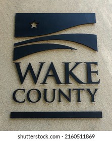 RALEIGH, NC - MAY 2021: Wake County Logo As A Three-dimensional Sign Hanging On A Wall Outside A Building