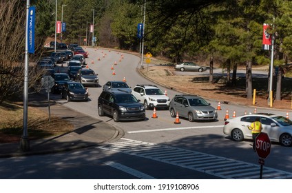 Raleigh, NC - United States- 02-17-2021: Vehicles Line Up For A Vaccine Drive Thru Clinic At PNC Arena By Appointment Only.