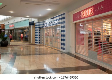 Raleigh, NC/United States- 03/18/2020: Shuttered Retail Stores Are Seen Inside A Deserted Shopping Mall. Many Have Closed Voluntarily Amid The Coronavirus (COVID-19) Outbreak.