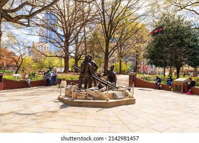 Raleigh, North Carolina USA-04 01 2022: People Gather To Read And Eat Lunch At Nash Square Park In Downtown Raleigh.