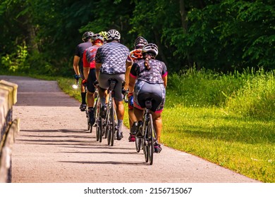 Raleigh, North Carolina USA-05 15 2022: A Group Of Cyclists On The Neuse River Trail.