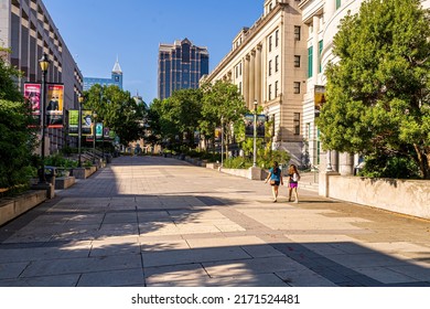 Raleigh, North Carolina USA-06 25 2022: People Walking Down The Mall Between The History And Natural Sciences Museum In Raleigh