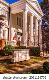 Raleigh, North Carolina USA-11 25 2021: The North Carolina Democratic Party Headquarters is a Large White Building With Features of Antebellum or Plantation Style Architecture.