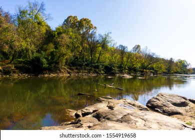 Raleigh,NC/USA-11/9/19:Standing On Boulders Looking Down The Neuse River Along The Neuse River Trail.