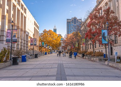 Raleigh,North Carolina / USA - Nov 24 2019 : People Walk Through Bicentennial Plaza At Downtown Raleigh Near North Carolina Museum Of Natural Sciences.