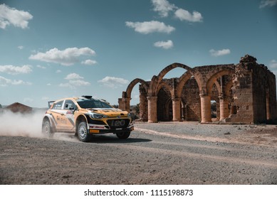 Rally Car Passing By Agios Sozomenos In Cyprus For The ERC Cyprus Rally 2018