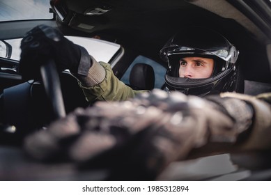 Rally Driver Concept. Man In The Helmet Drives A Car.