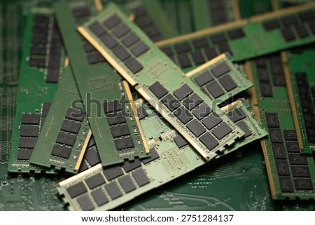 RAM memory module computer hardware technology. RAM DDR4 memory chip circuit board. RAM computer motherboard slot performance upgrade. RAM DRAM microchip processing system computing.