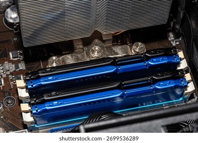 RAM modules plugged into DIMM slots on the motherboard in a dual channel system.