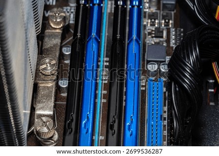 RAM modules plugged into DIMM slots on the motherboard in a dual channel system.