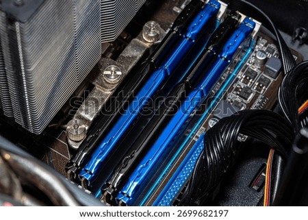 RAM modules plugged into DIMM slots on the motherboard in a dual channel system.