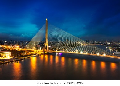 Rama 8 bridge at Chopraya river on night scene cityscape in Bangkok Thailand