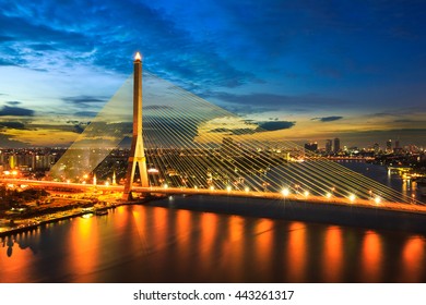 Rama 8 Bridge at night in Bangkok and Chopraya river, Thailand