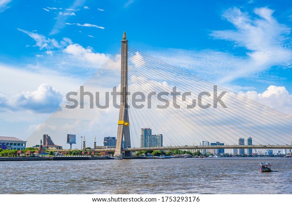 Rama VIII Bridge with beautiful sky.The Rama\
VIII Bridge or called is a suspending bridge crossing the Chao\
Phraya River in Bangkok,\
Thailand