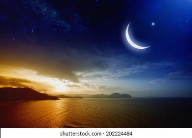 Ramadan background with moon and stars, holy month, beautiful red sunset over sea. Elements of this image furnished by NASA - Powered by Shutterstock