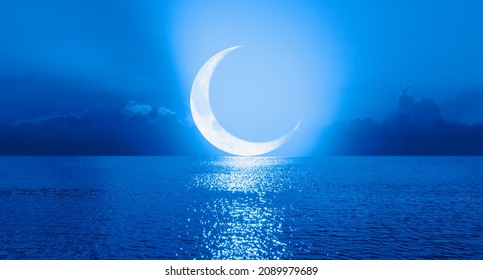 Ramadan concept - Crescent moon over the tropical sea at night  - Powered by Shutterstock