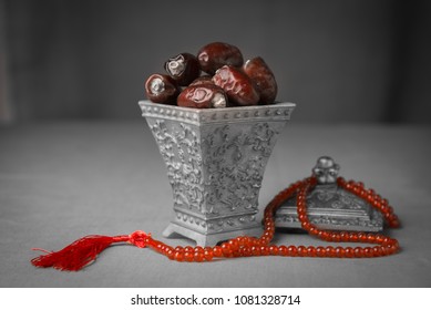 Ramadan Festival Background. Date Fruits In An Ornamental Bowl With Prayer Beads.