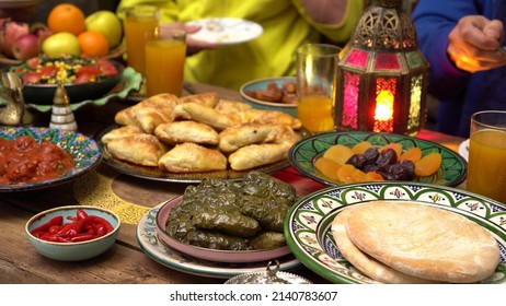 Ramadan Iftar, Eid In Islam. Happy Authentic Arabic Muslim Family Have A Dinner At Home Together. Islamic Holiday. Concept Of Religion