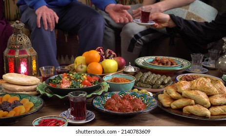 Ramadan Iftar, Eid In Islam. Happy Authentic Arabic Muslim Family Have A Dinner At Home Together. Islamic Holiday. Concept Of Religion