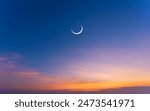 Ramadan islamic night sunset with eastern moon, Hilal and Eid clear sky at night with some clouds 