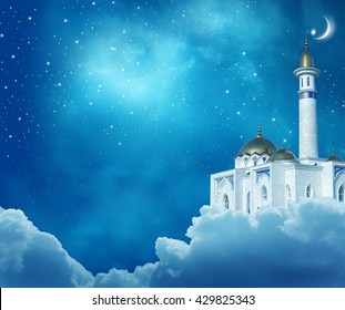 Ramadan Kareem background.Crescent moon at a top of a mosque