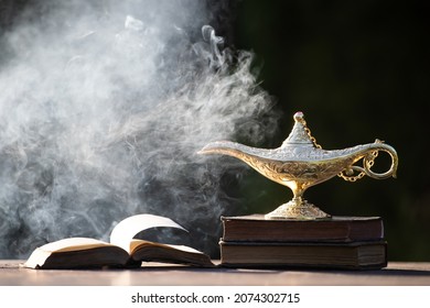 Ramadan Kareem festive greeting card for Muslim holy month with Aladdin lamp of wishes and Quran - Shutterstock ID 2074302715
