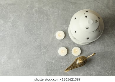 Ramadan Lantern With Aladdin Lamp And Candles On Grey Background, Top View