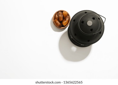 Ramadan Lantern And Wood Bowl With Dates On White Background, Top View