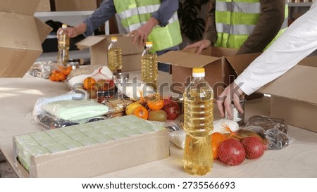 Ramadan Volunteer Program. A volunteer team packing donation food. Humanitarian aid