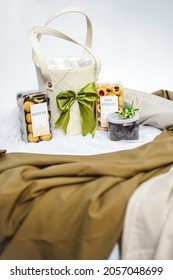 Ramadhan gift. Hampers moslem theme for celebrete the holy, can be bake snack, nastar, bakery, cookies, pudiing, chococips, roll cake, castangel, pandan. with greeting card and accsories. - Shutterstock ID 2057048699