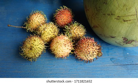 Rambutan And A Coconut From A Swimming Market In Can Tho, Mekong Delta, Vietnam, January