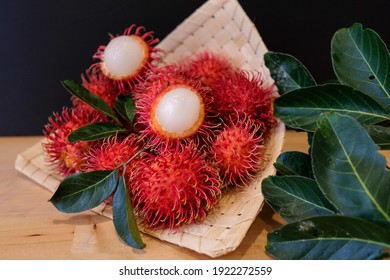 Rambutan Or Hairy Fruit Is A Tropical Fruit. A Close Up Look On Ripe Rambutan. Selective Focus