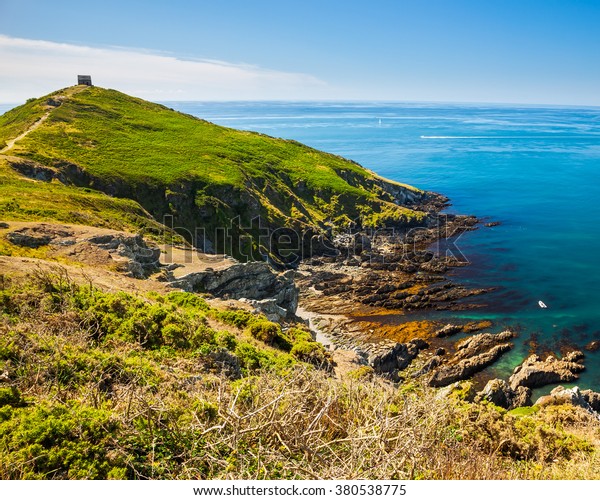 Rame Head at the start of Whitsand\
Bay as seen from the coast path. Cornwall England\
UK
