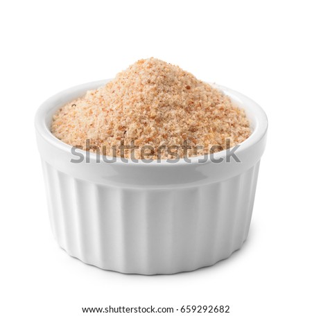 Ramekin with bread crumbs isolated on white