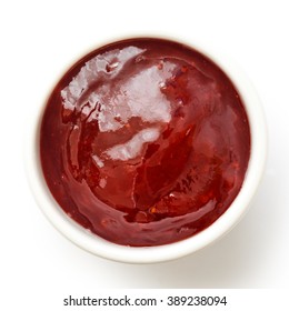 Ramekin Of Red Strawberry Jam Isolated On White. From Above.