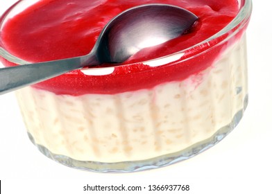 Ramekin Of Rice Pudding With A Strawberry Coulis